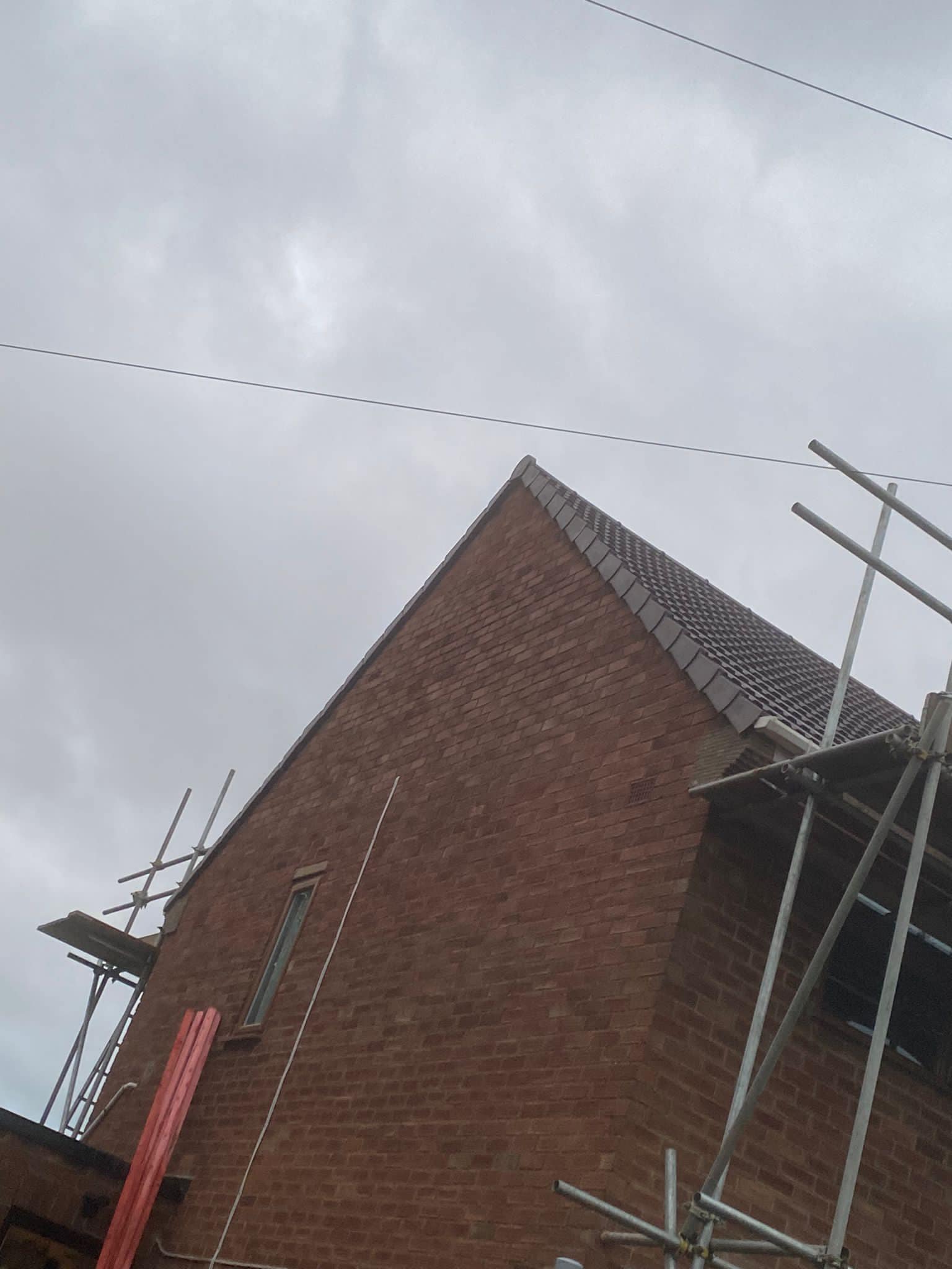 Professional roofers working on a property in London - KS Roof Master