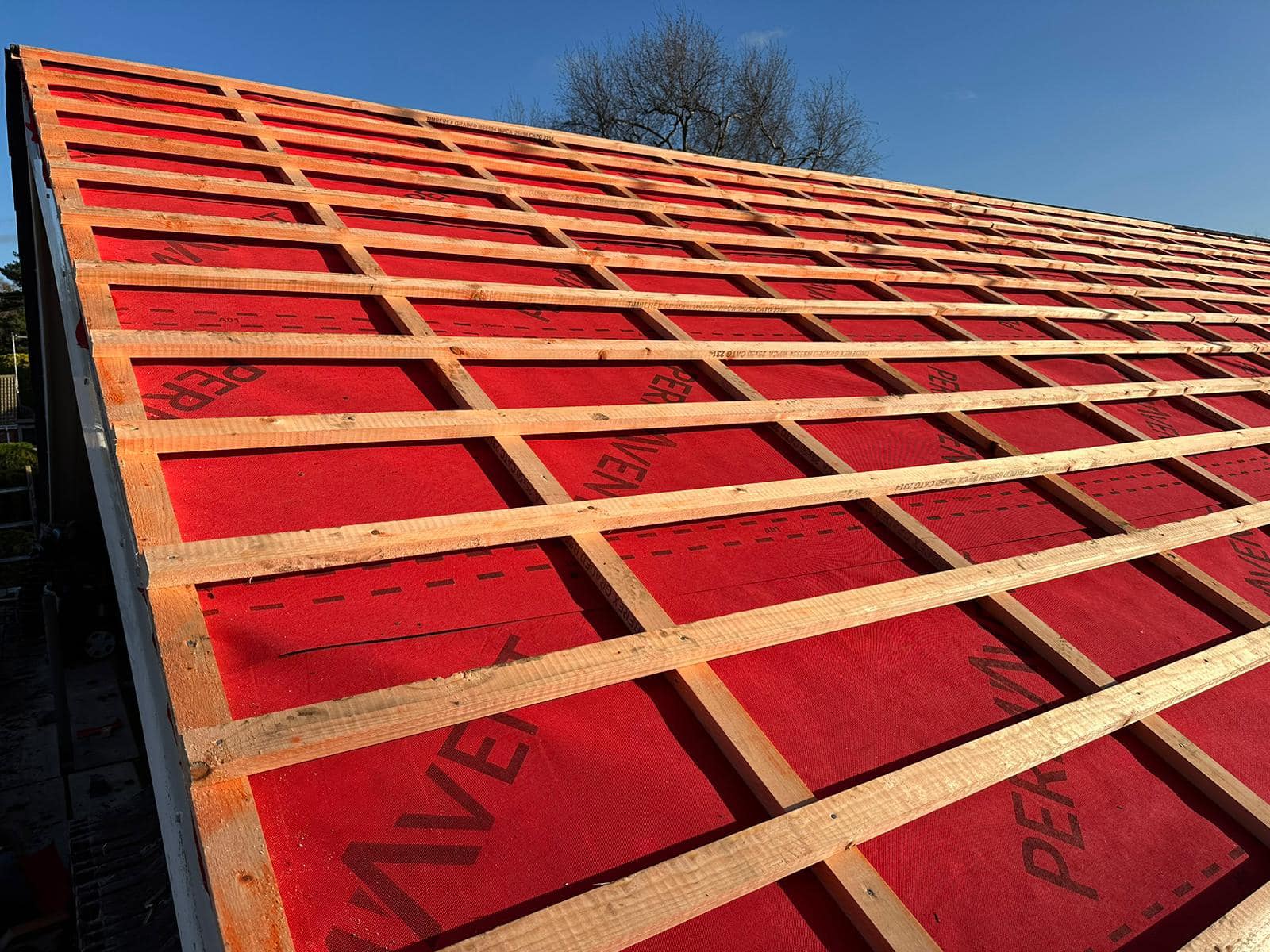 Professional roofers working on a property in London - KS Roof Master