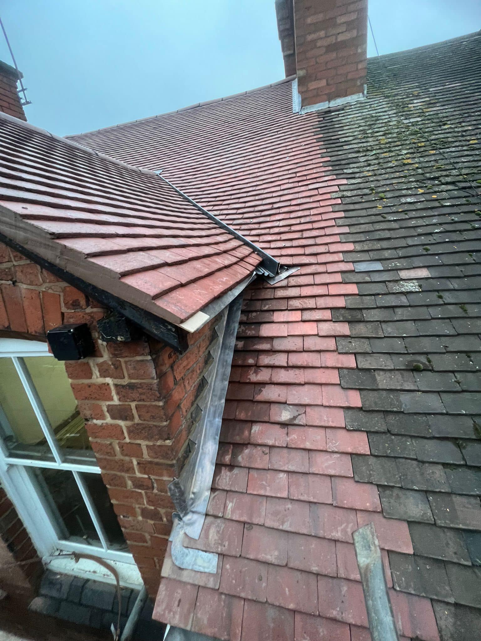 Professional roofers working on a property in London - KS Roof Master
