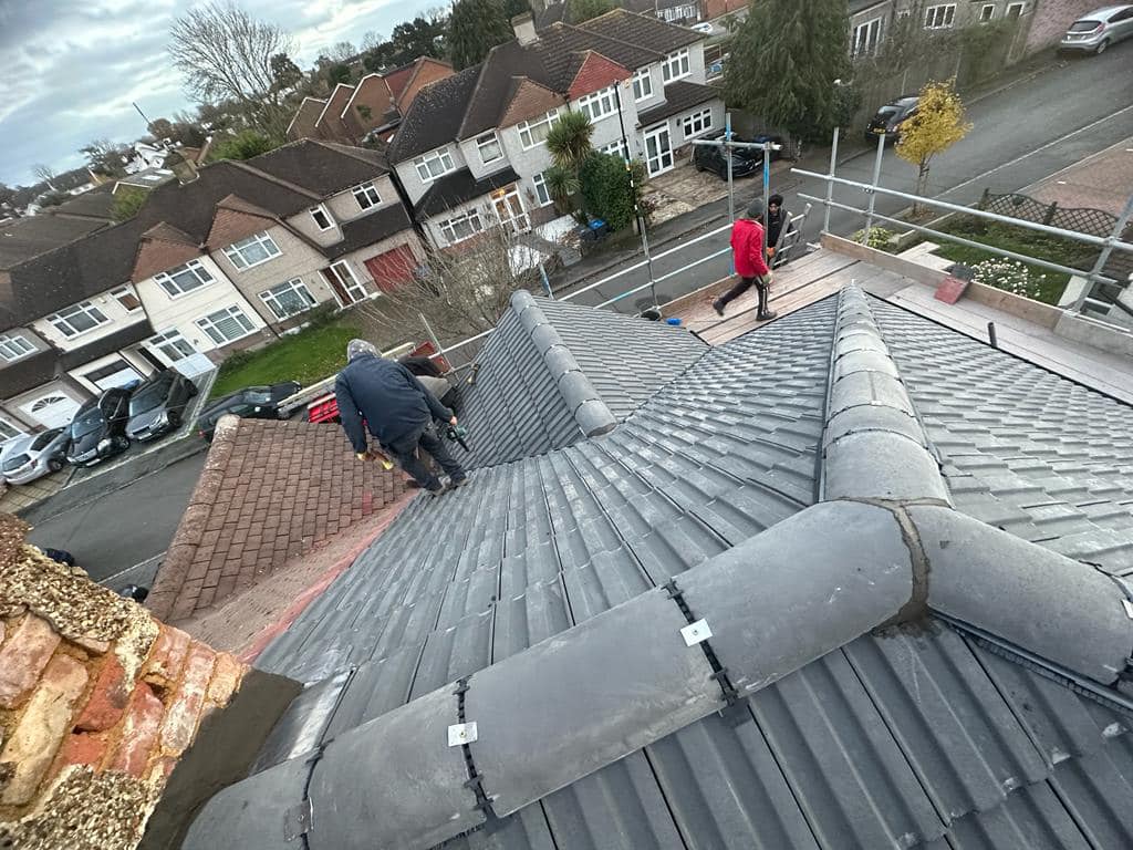 Professional roofers working on a property in London - KS Roof Master