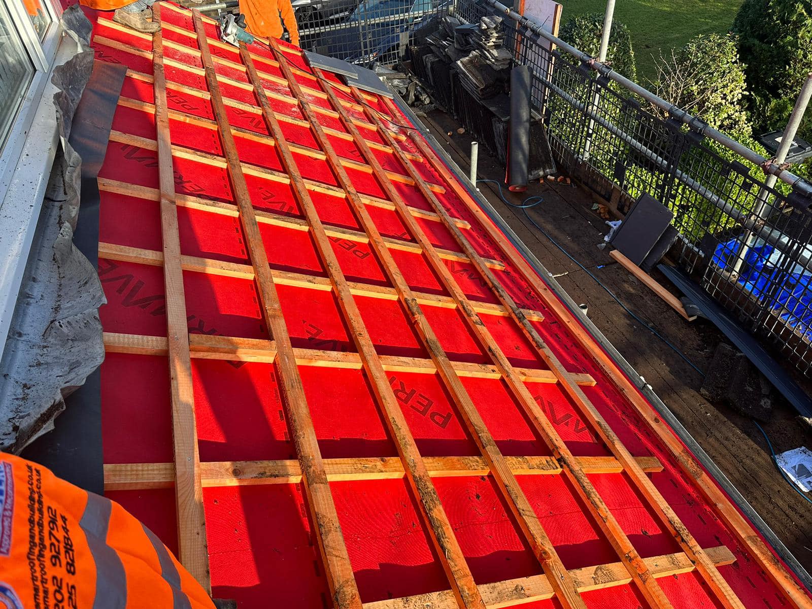 Professional roofers working on a property in London - KS Roof Master