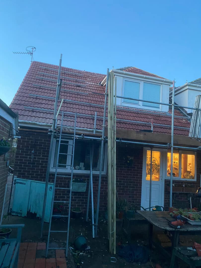 Professional roofers working on a property in London - KS Roof Master