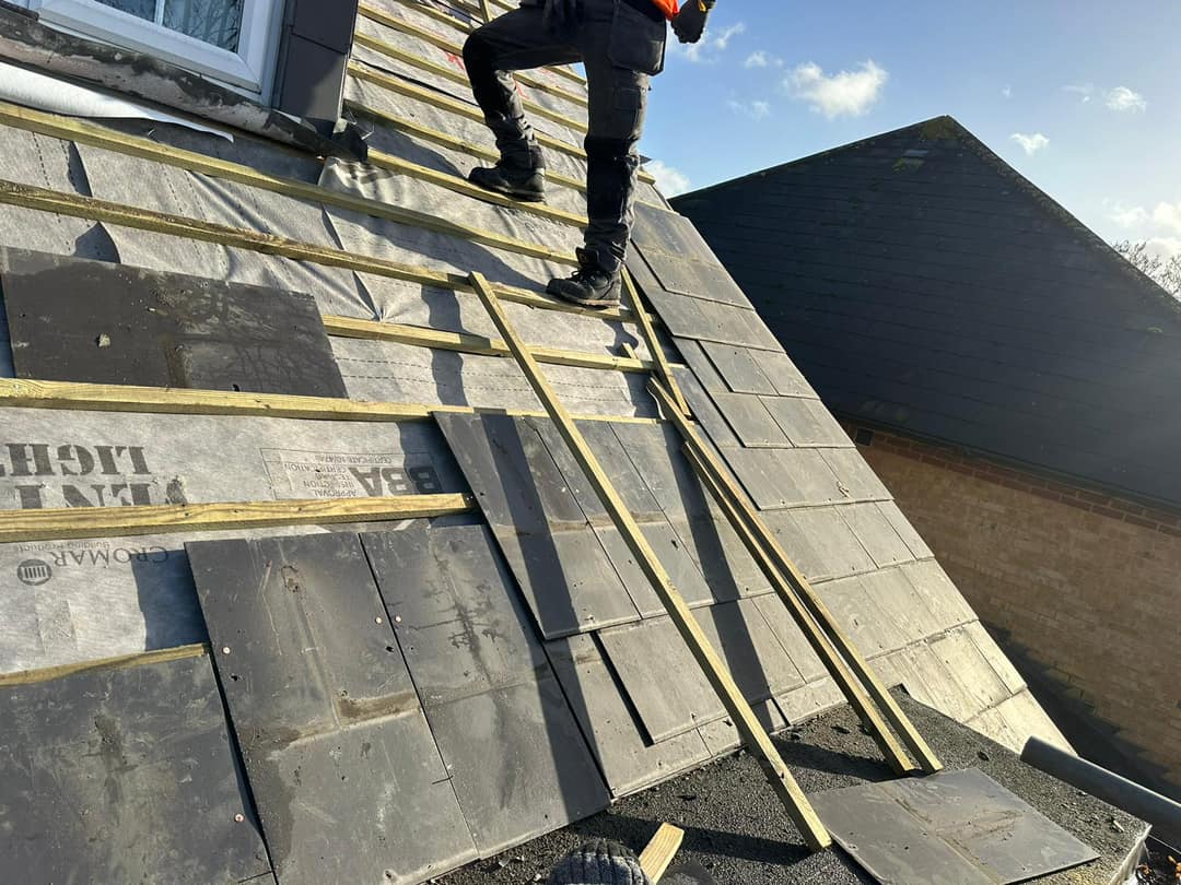 Professional roofers working on a property in London - KS Roof Master