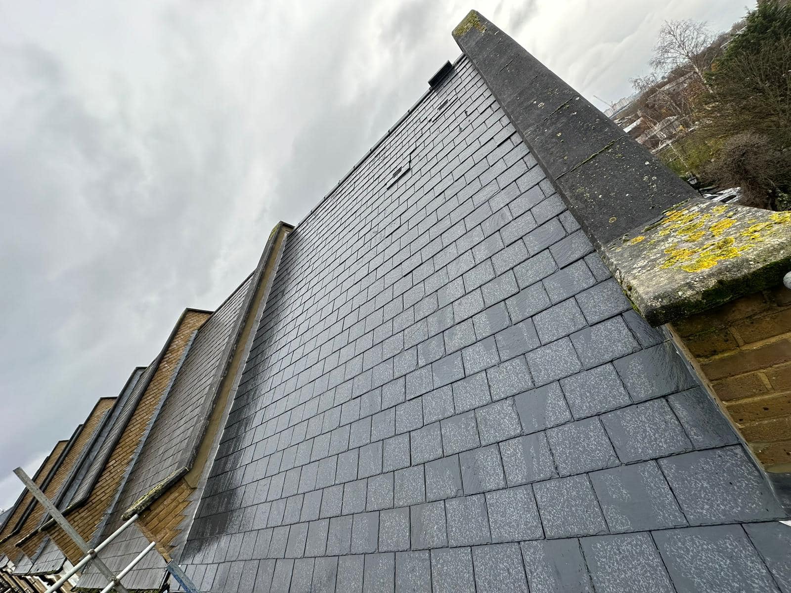 Professional roofers working on a property in London - KS Roof Master