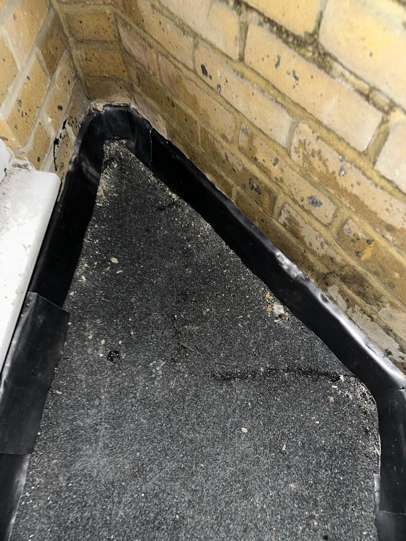 Professional roofers working on a property in London - KS Roof Master