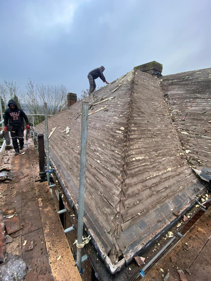 Professional roofers working on a property in London - KS Roof Master