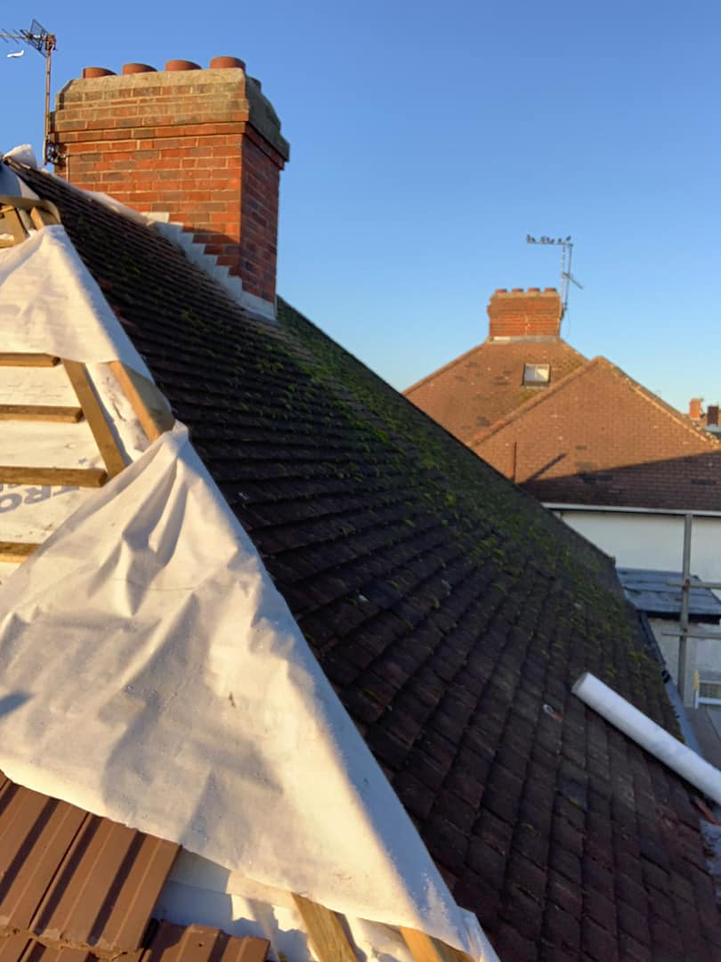 Professional roofers working on a property in London - KS Roof Master