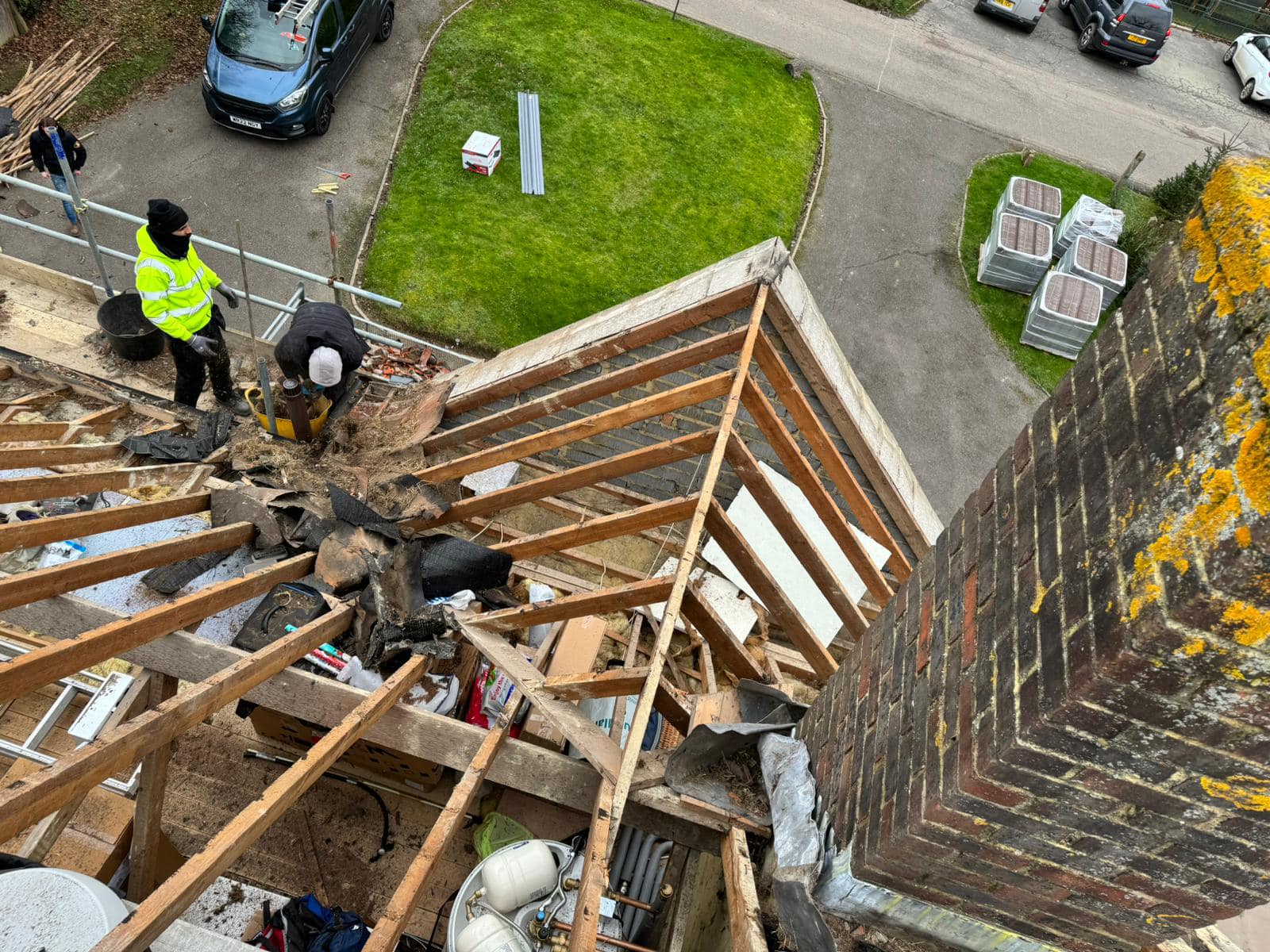 Professional roofers working on a property in London - KS Roof Master