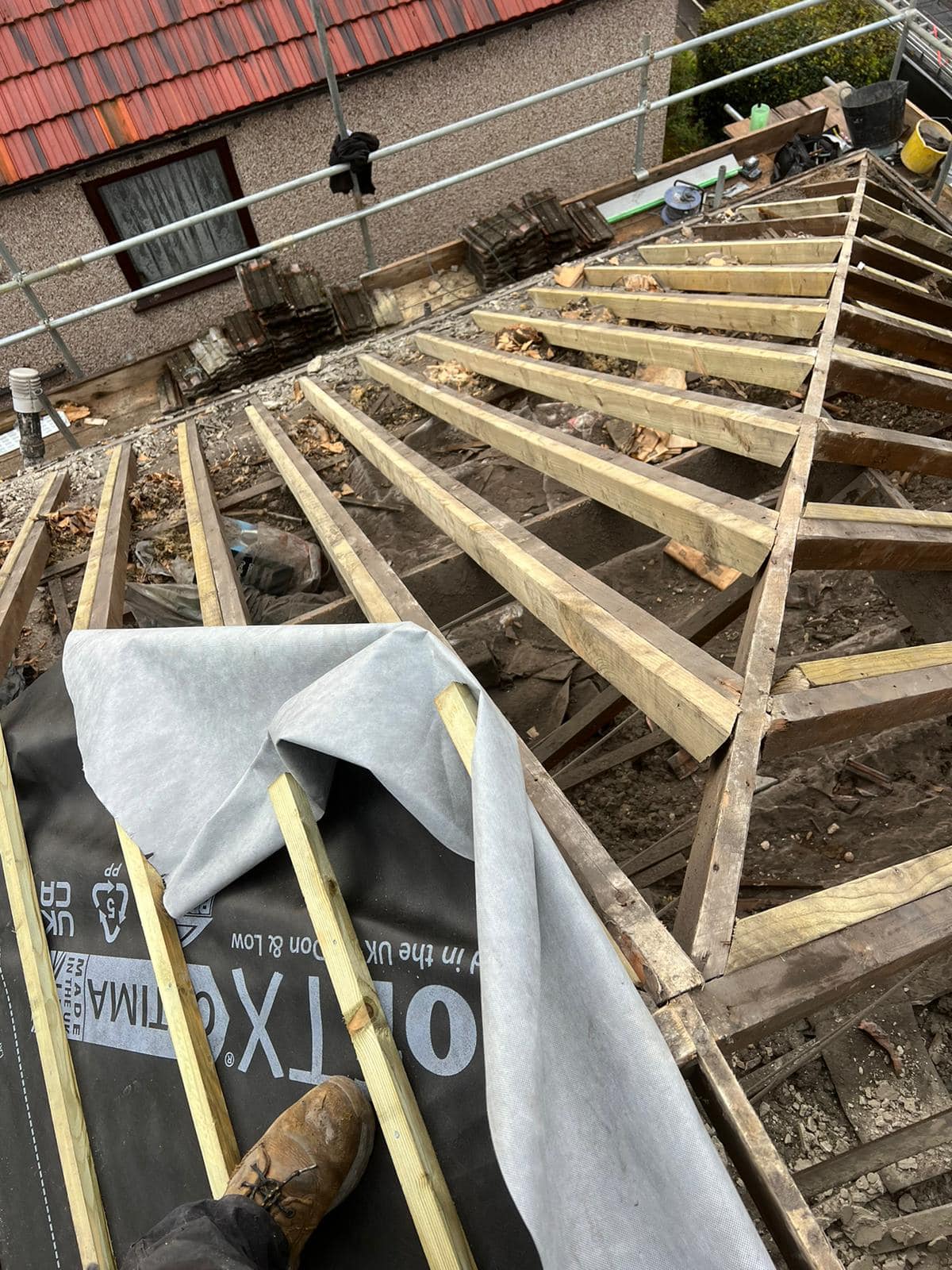 Professional roofers working on a property in London - KS Roof Master