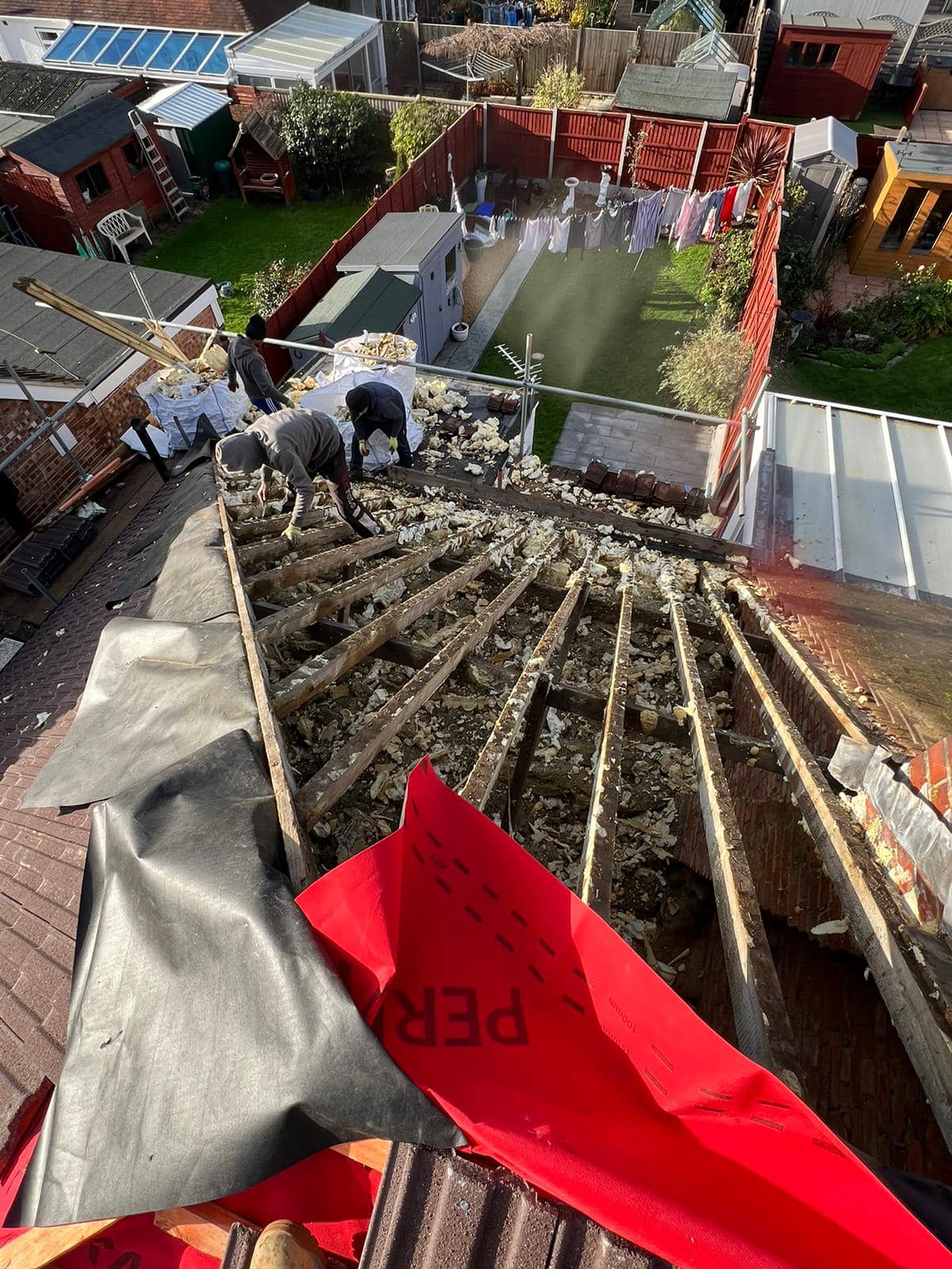 Professional roofers working on a property in London - KS Roof Master