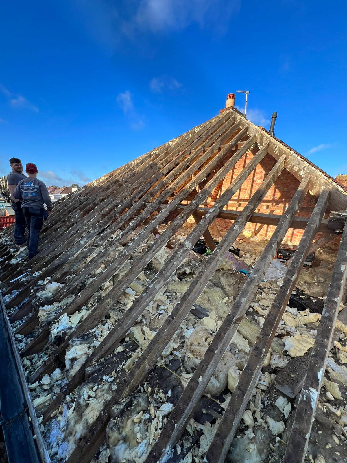 Professional roofers working on a property in London - KS Roof Master