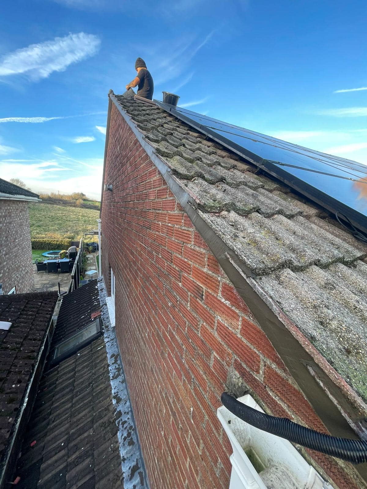 Professional roofers working on a property in London - KS Roof Master