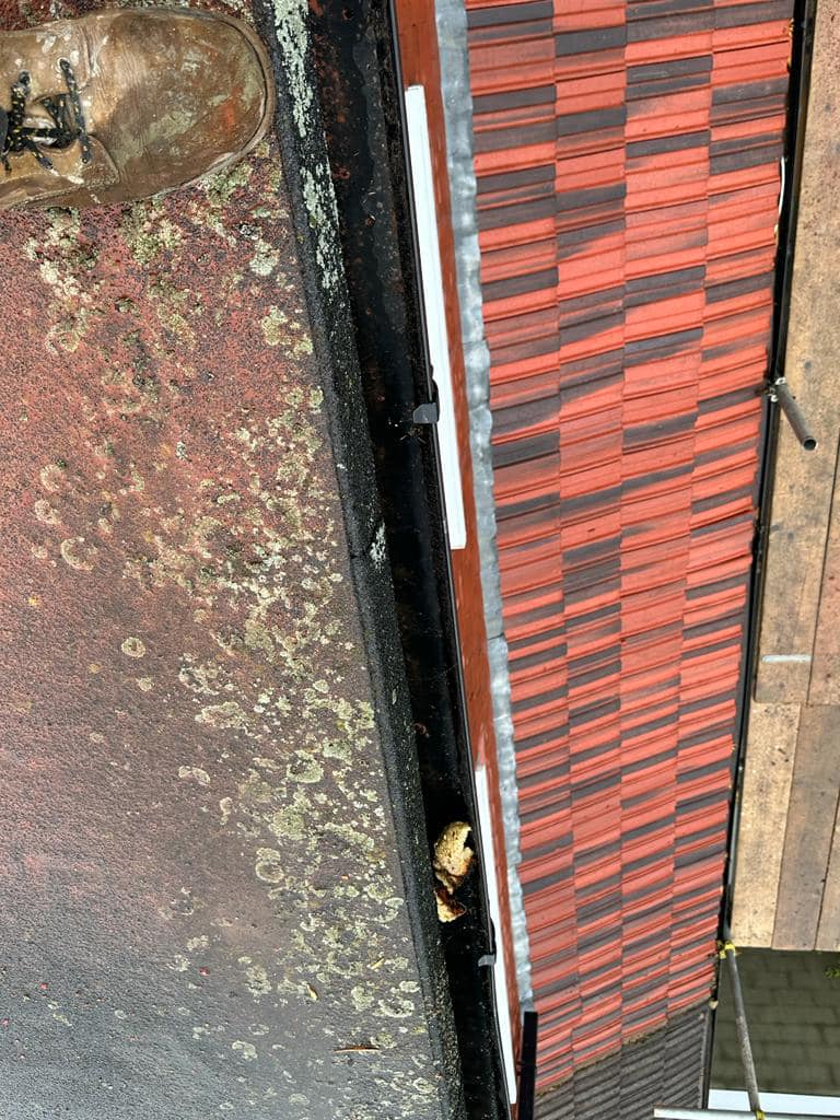 Professional roofers working on a property in London - KS Roof Master