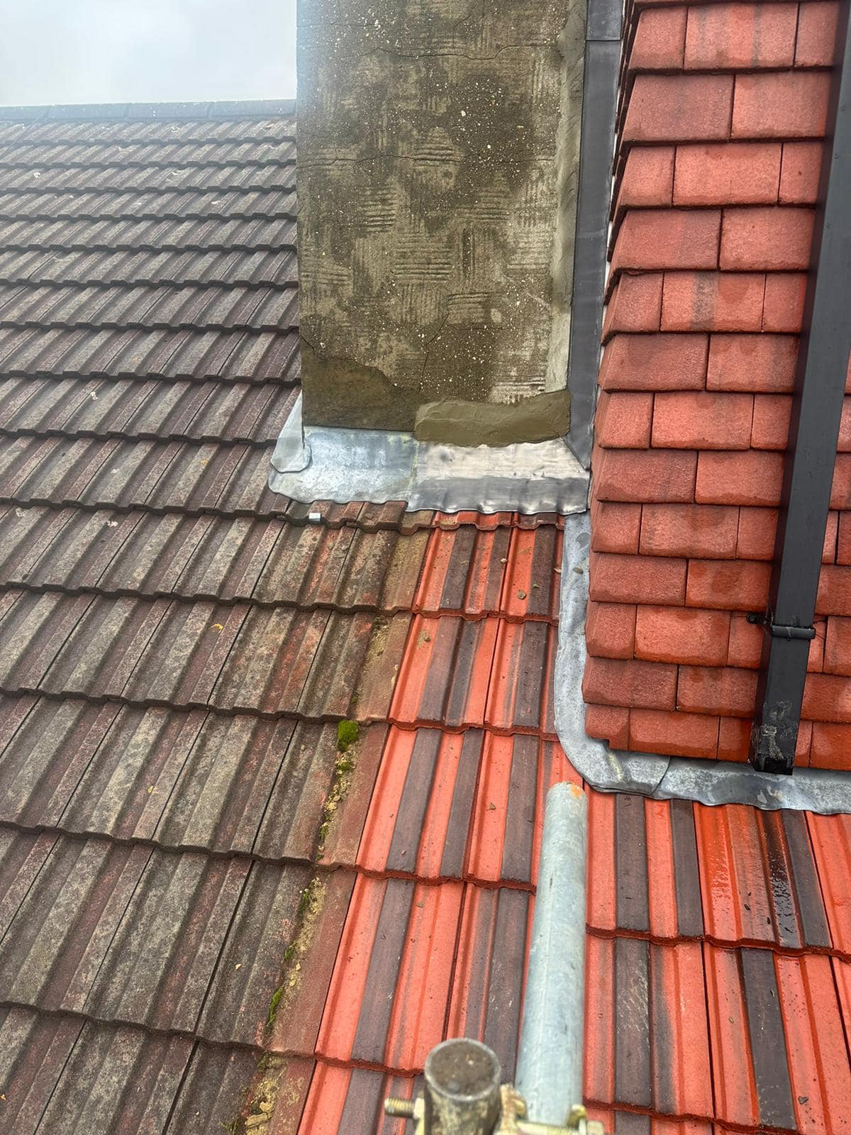 Professional roofers working on a property in London - KS Roof Master