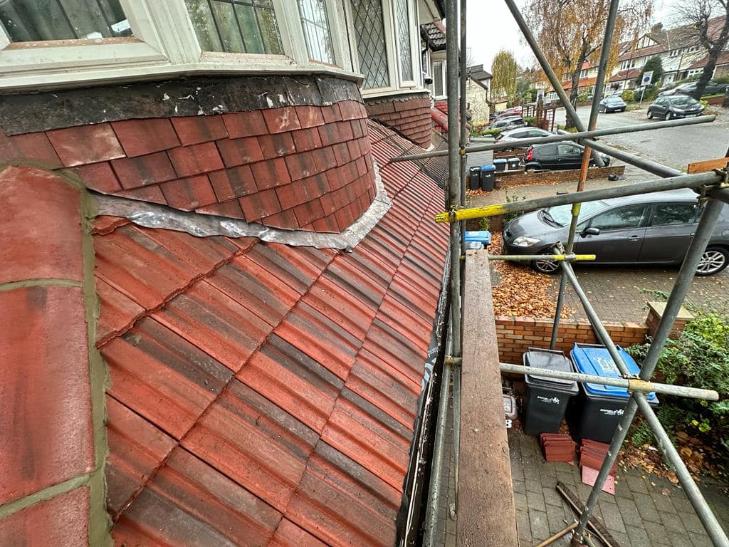 Professional roofers working on a property in London - KS Roof Master