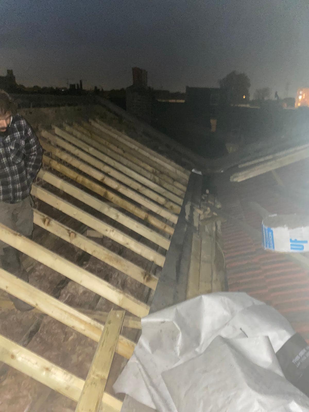 Professional roofers working on a property in London - KS Roof Master