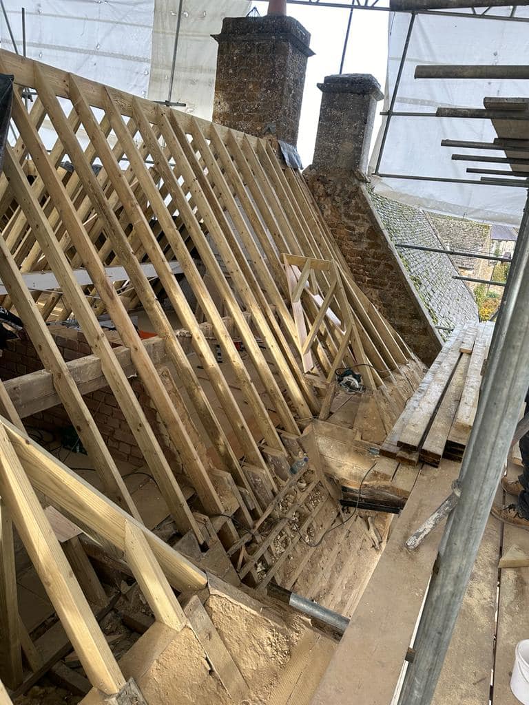 Professional roofers working on a property in London - KS Roof Master