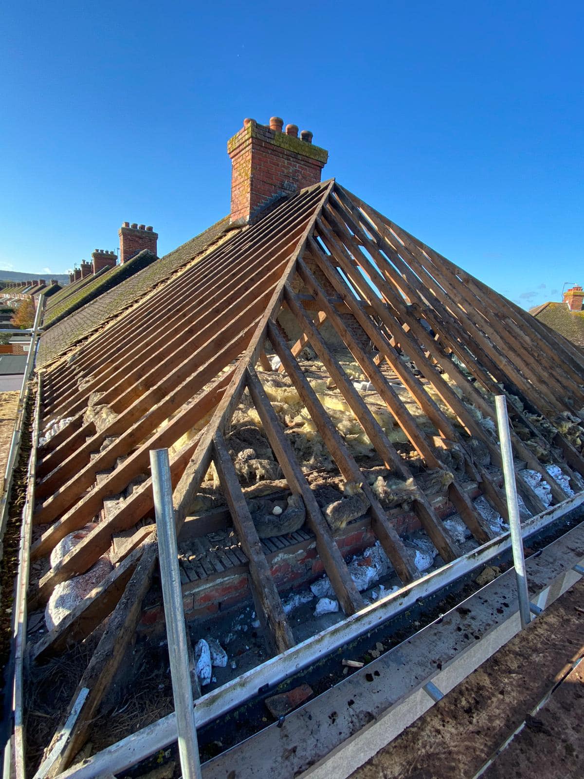 Professional roofers working on a property in London - KS Roof Master