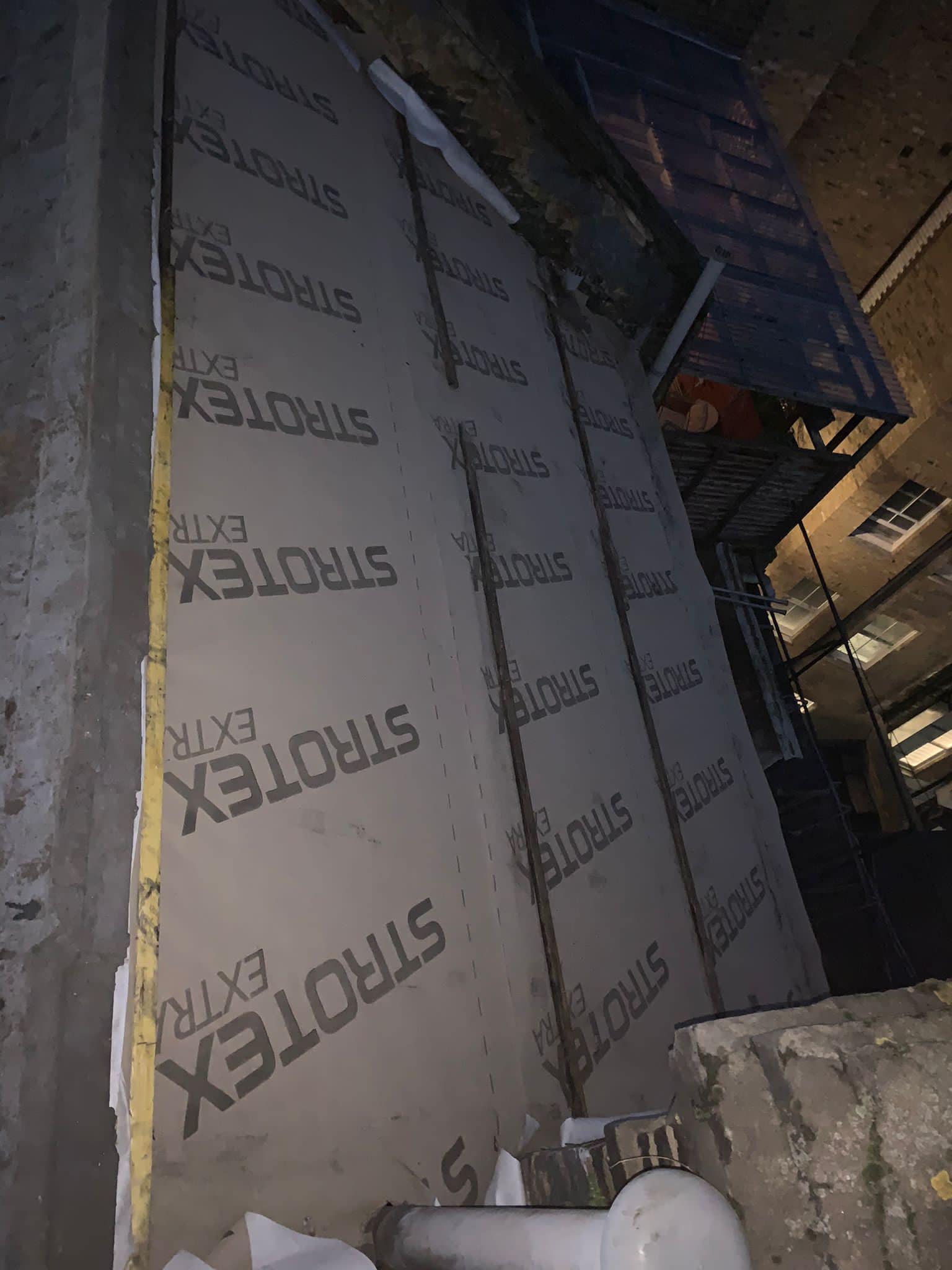 Professional roofers working on a property in London - KS Roof Master