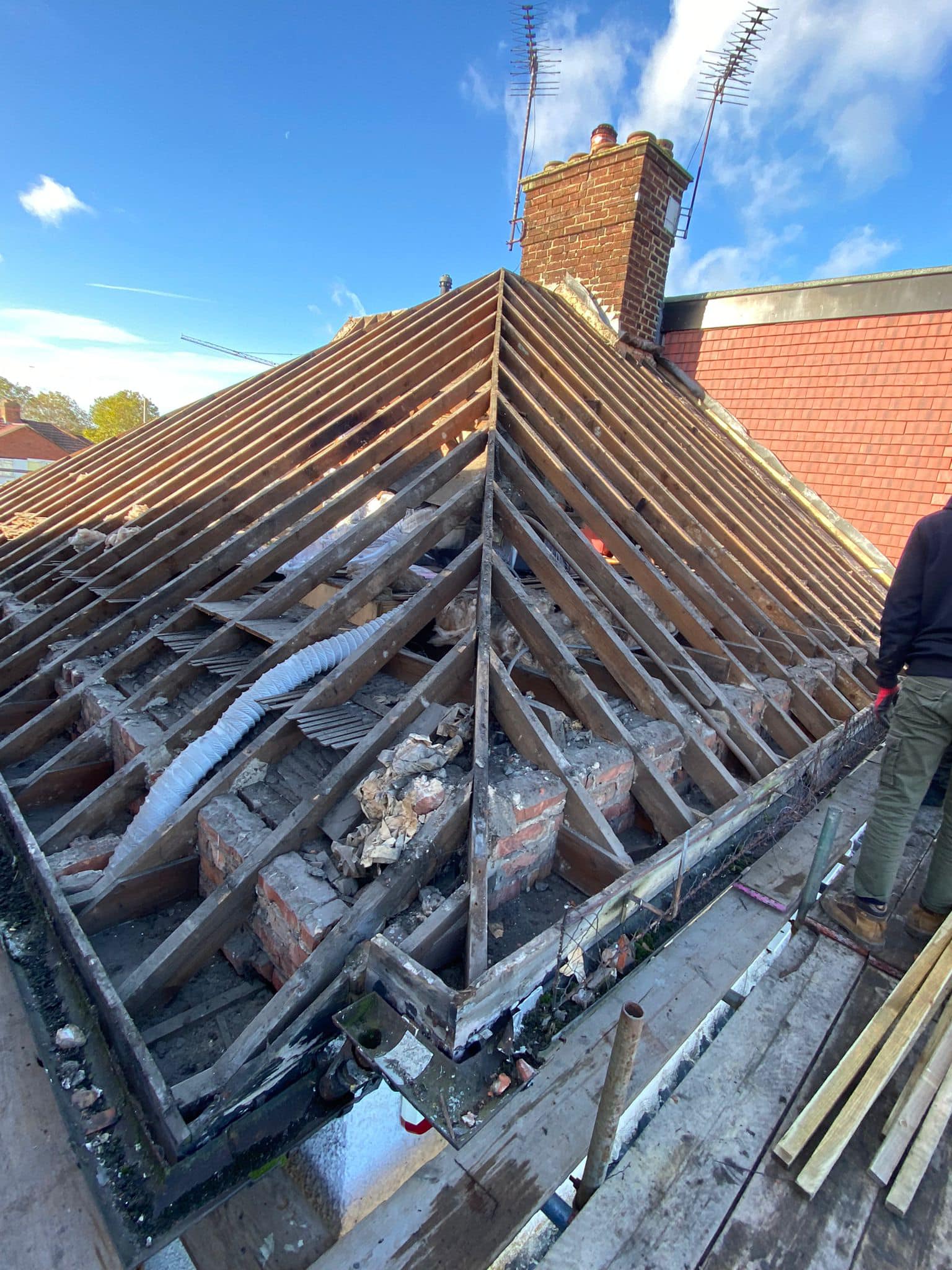 Professional roofers working on a property in London - KS Roof Master