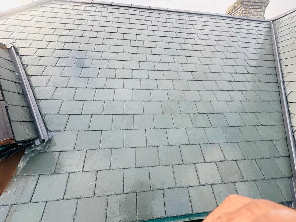 Professional roofers working on a property in London - KS Roof Master