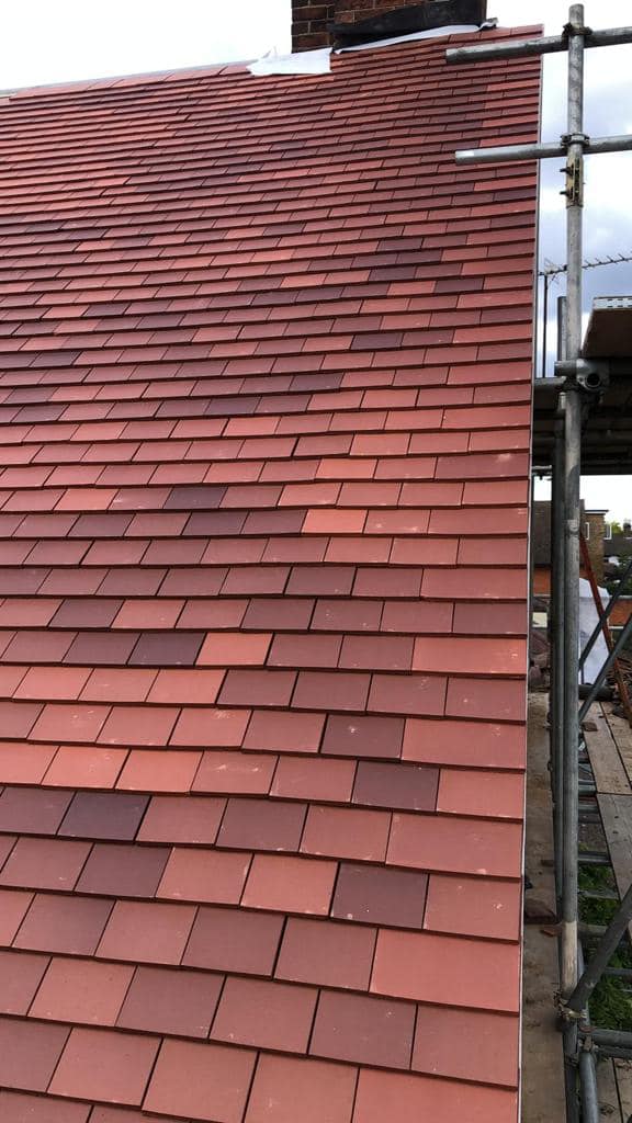 Professional roofers working on a property in London - KS Roof Master