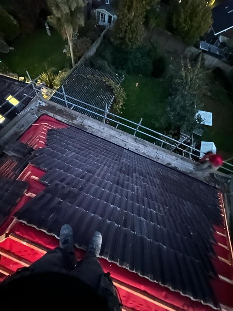 Professional roofers working on a property in London - KS Roof Master