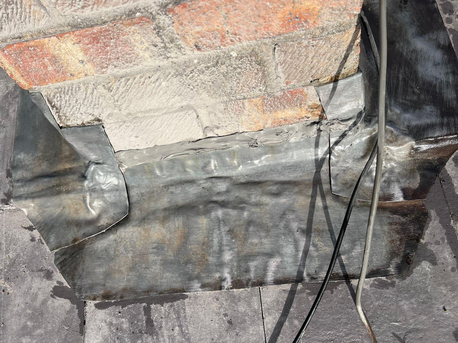Professional roofers working on a property in London - KS Roof Master