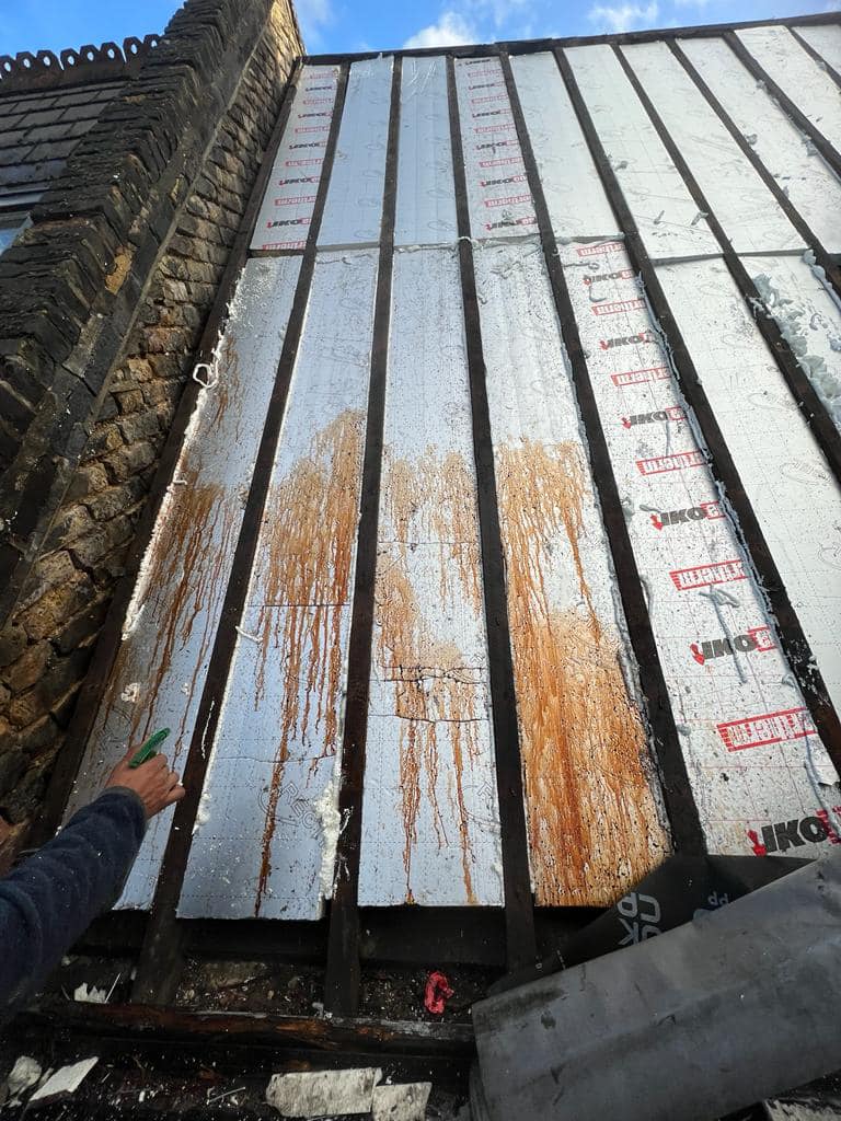 Professional roofers working on a property in London - KS Roof Master