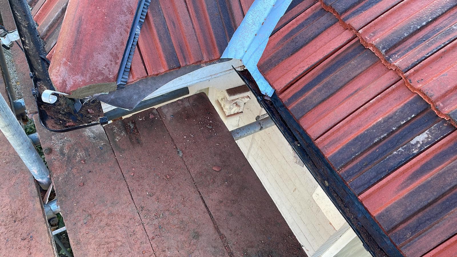Professional roofers working on a property in London - KS Roof Master