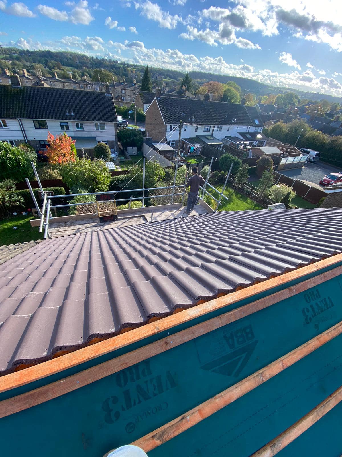 Professional roofers working on a property in London - KS Roof Master