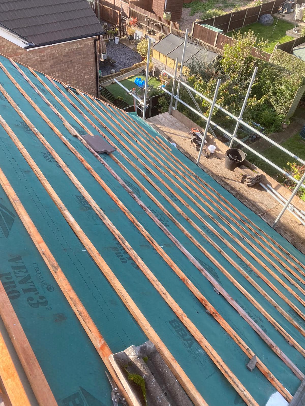 Professional roofers working on a property in London - KS Roof Master