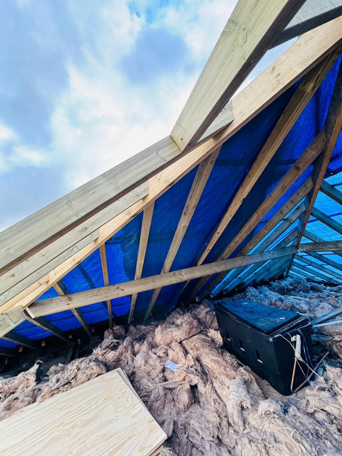 Professional roofers working on a property in London - KS Roof Master