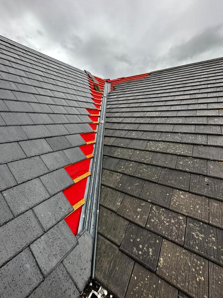 Professional roofers working on a property in London - KS Roof Master