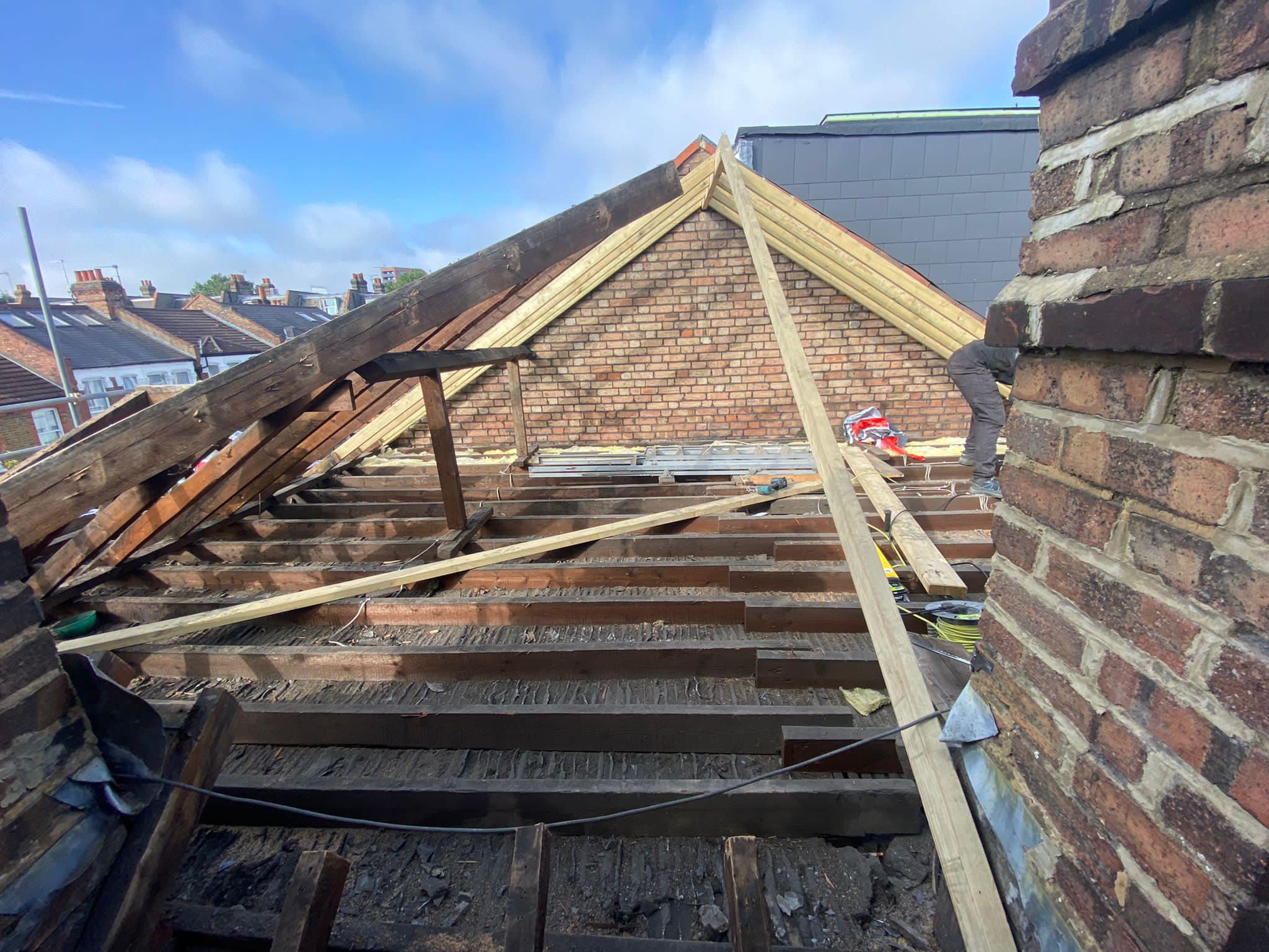 Professional roofers working on a property in London - KS Roof Master