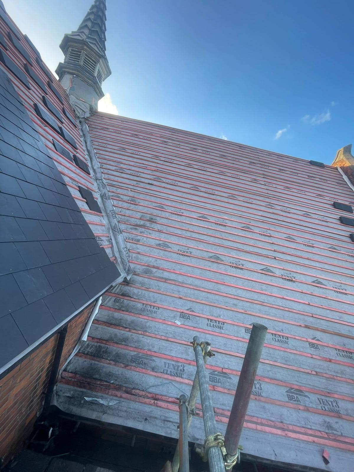 Professional roofers working on a property in London - KS Roof Master