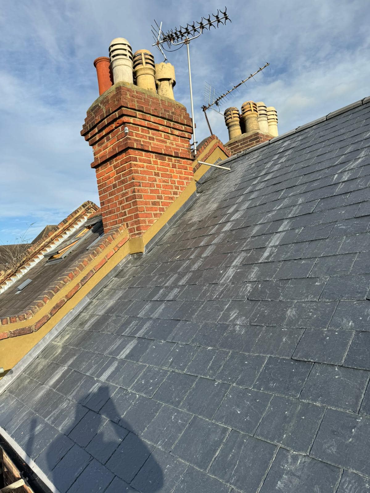 Professional roofers working on a property in London - KS Roof Master