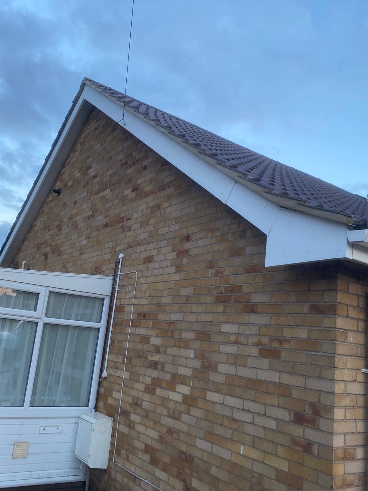 Professional roofers working on a property in London - KS Roof Master