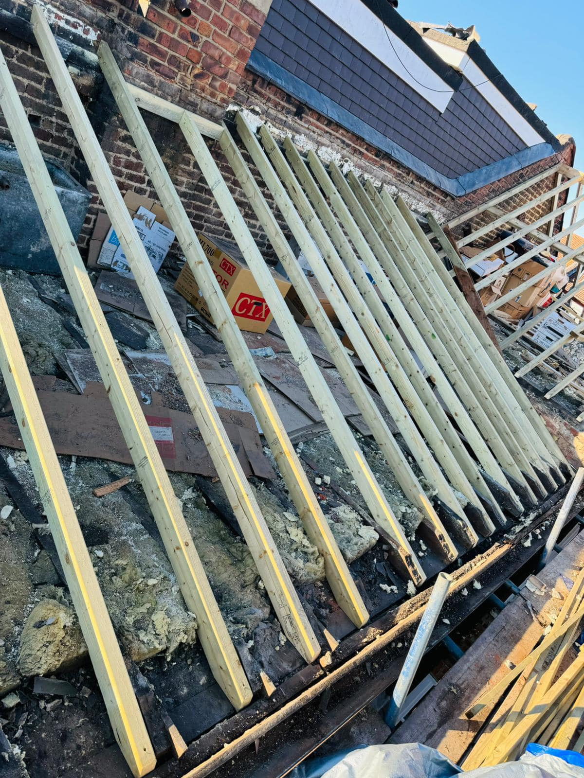 Professional roofers working on a property in London - KS Roof Master