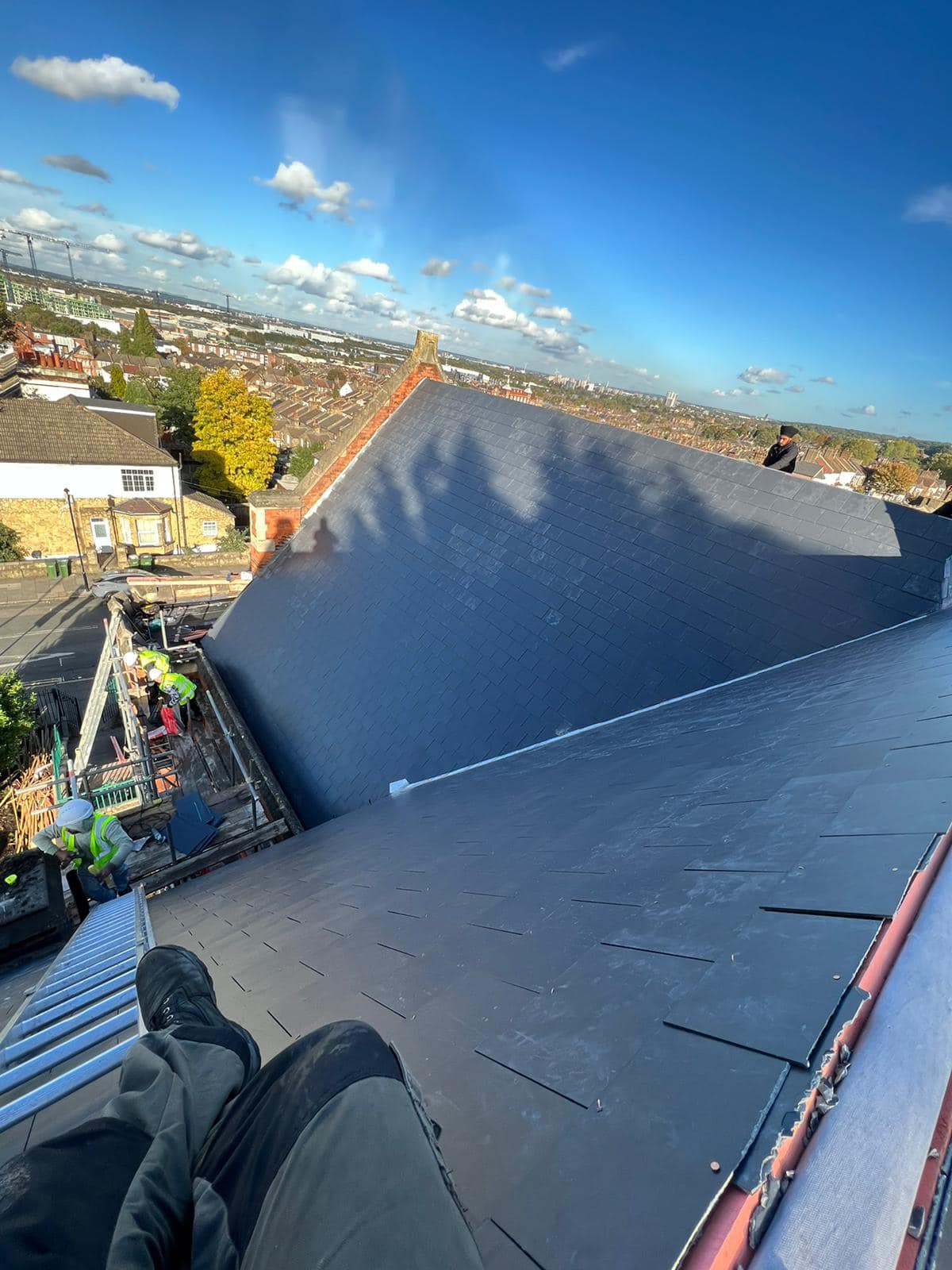 Professional roofers working on a property in London - KS Roof Master