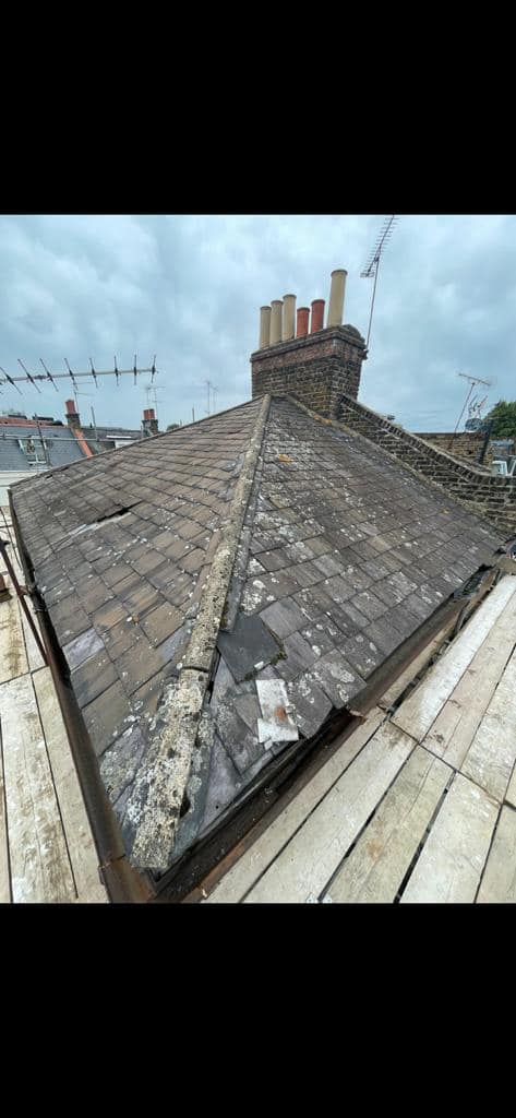Professional roofers working on a property in London - KS Roof Master