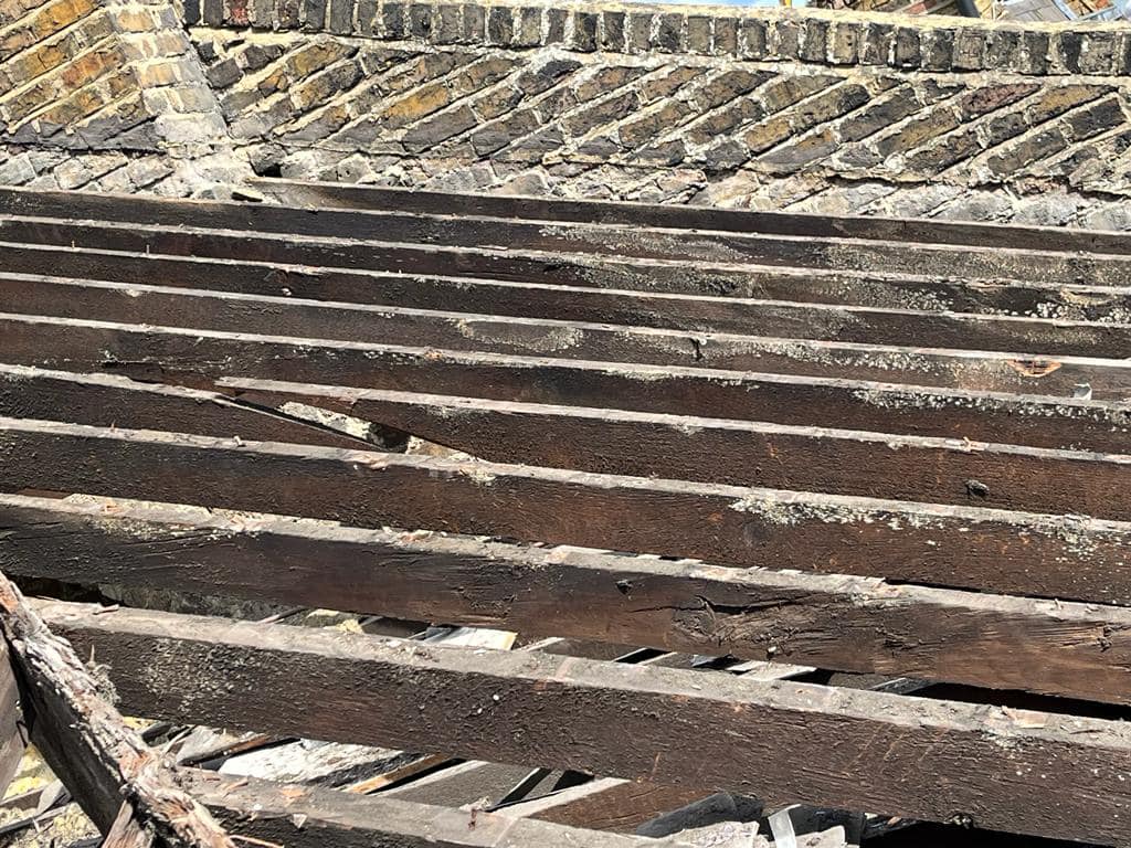 Professional roofers working on a property in London - KS Roof Master