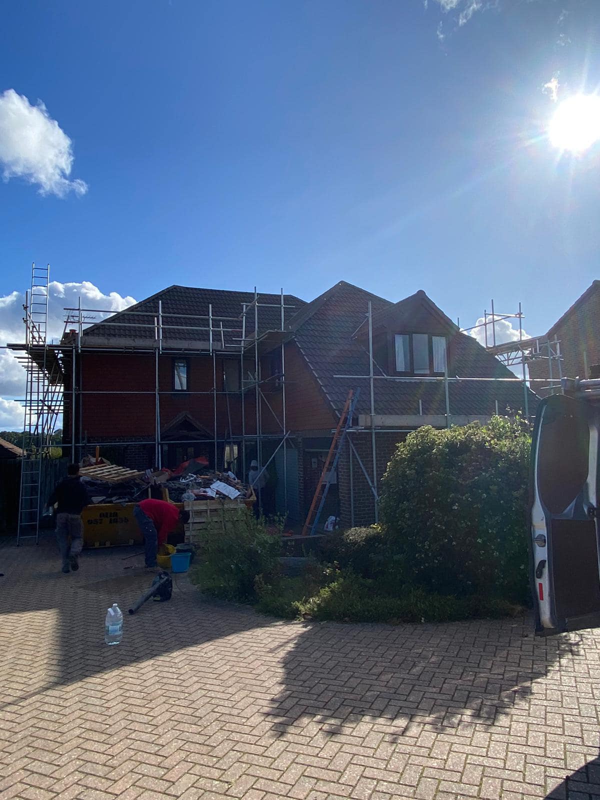 Professional roofers working on a property in London - KS Roof Master