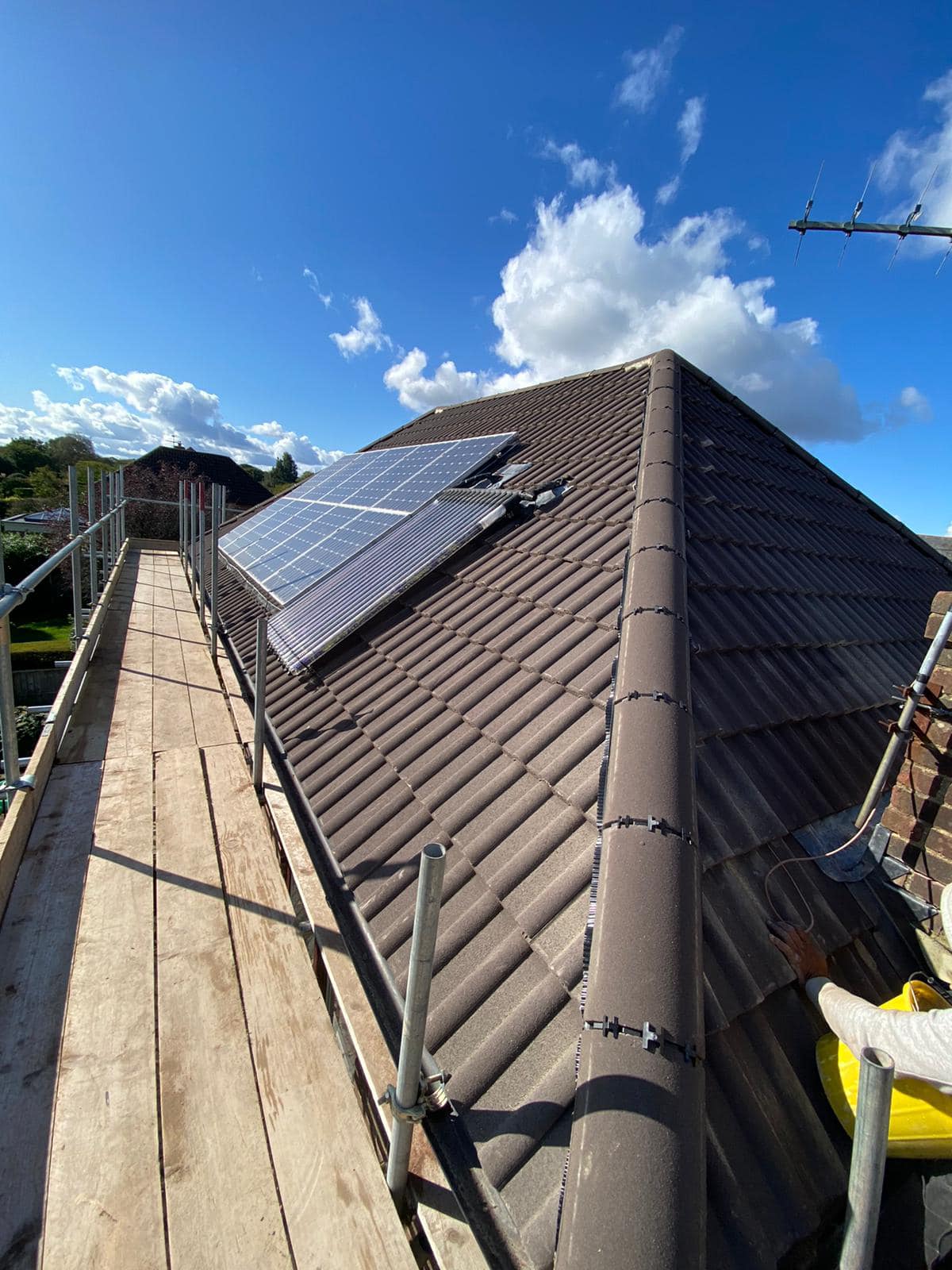 Professional roofers working on a property in London - KS Roof Master