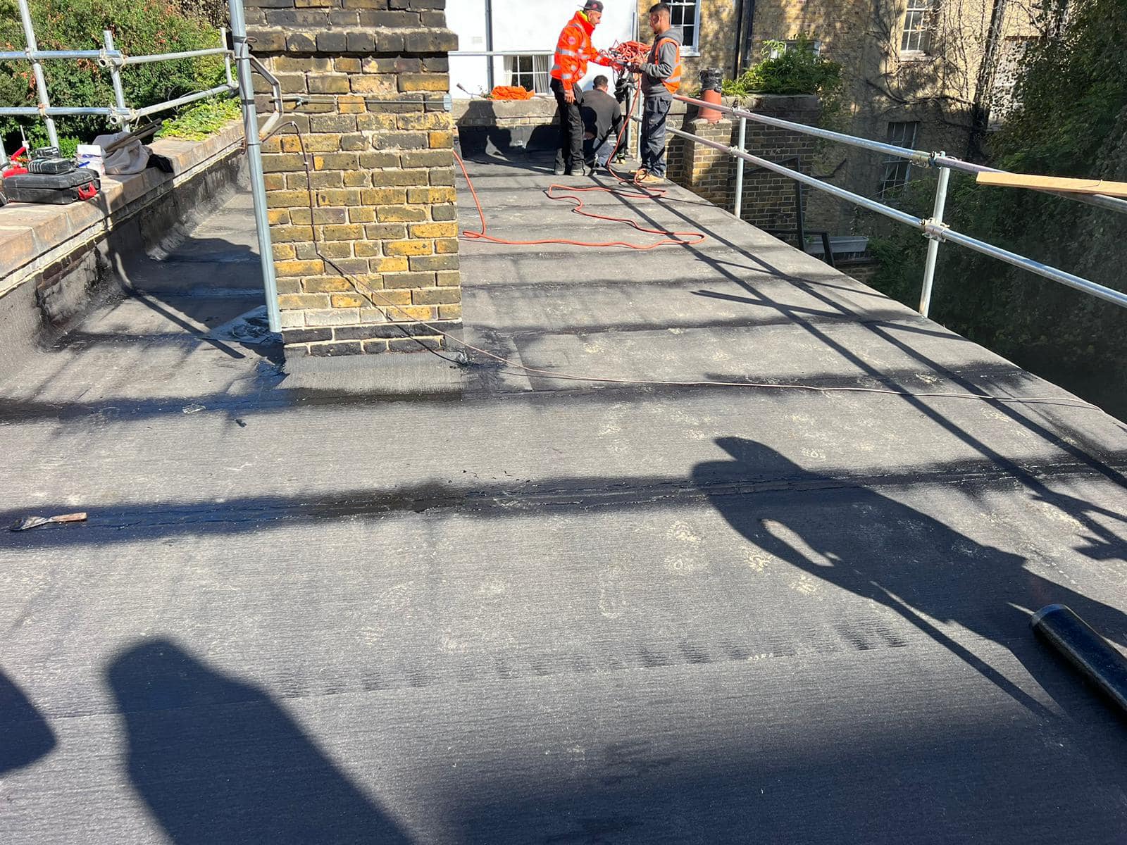 Flat roof coating in Brixton