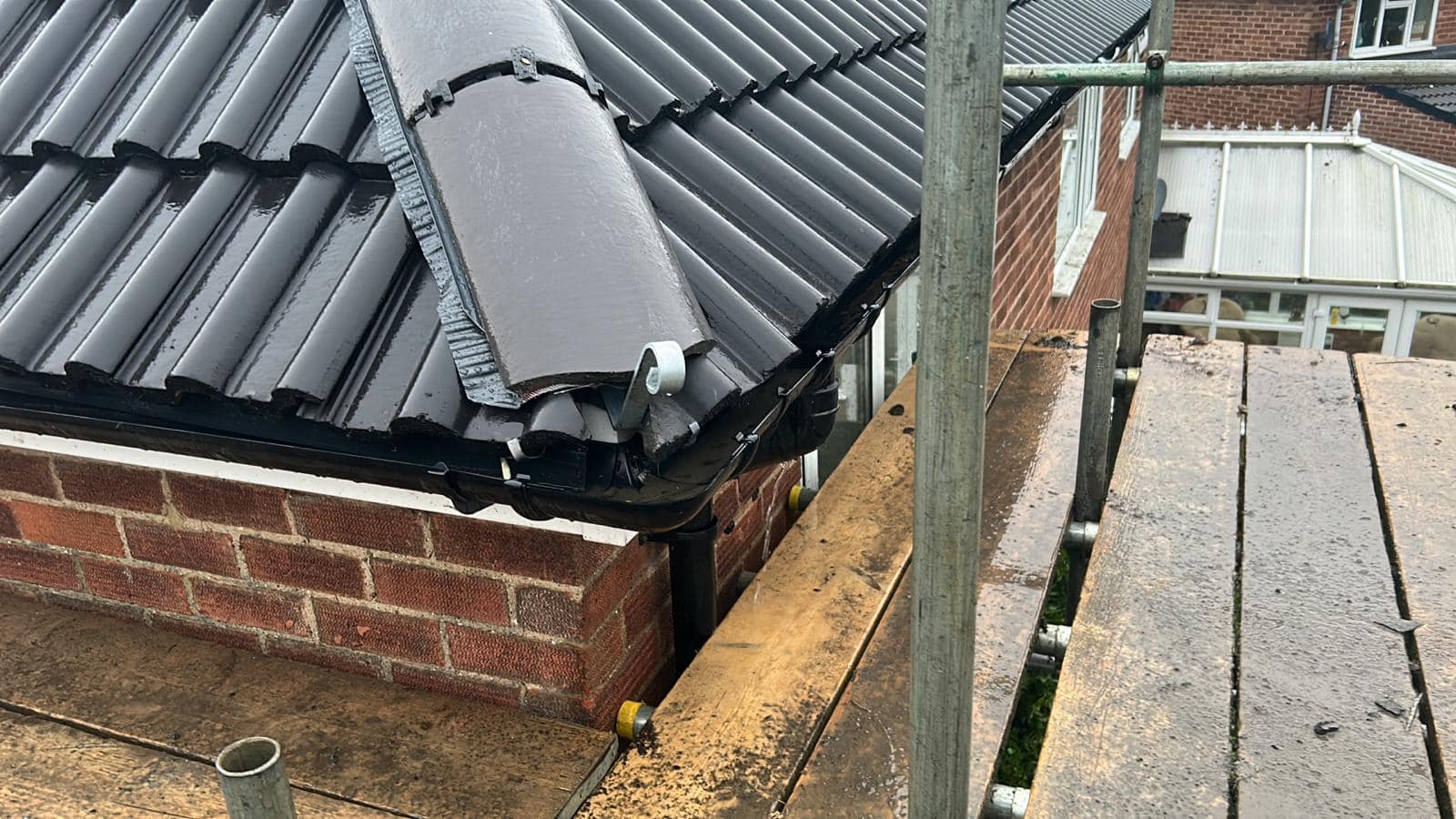 Professional roofers working on a property in London - KS Roof Master