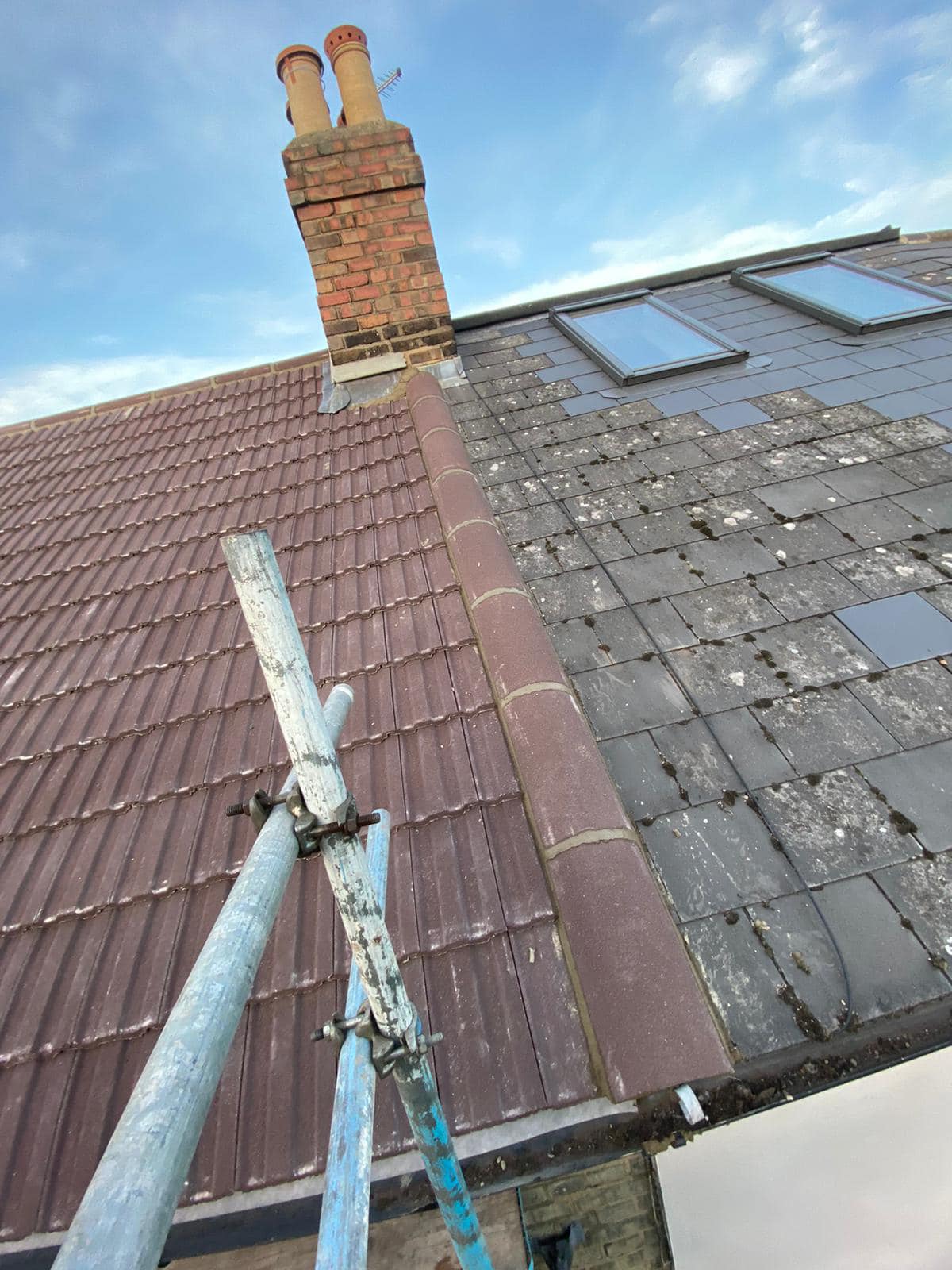 Professional roofers working on a property in London - KS Roof Master