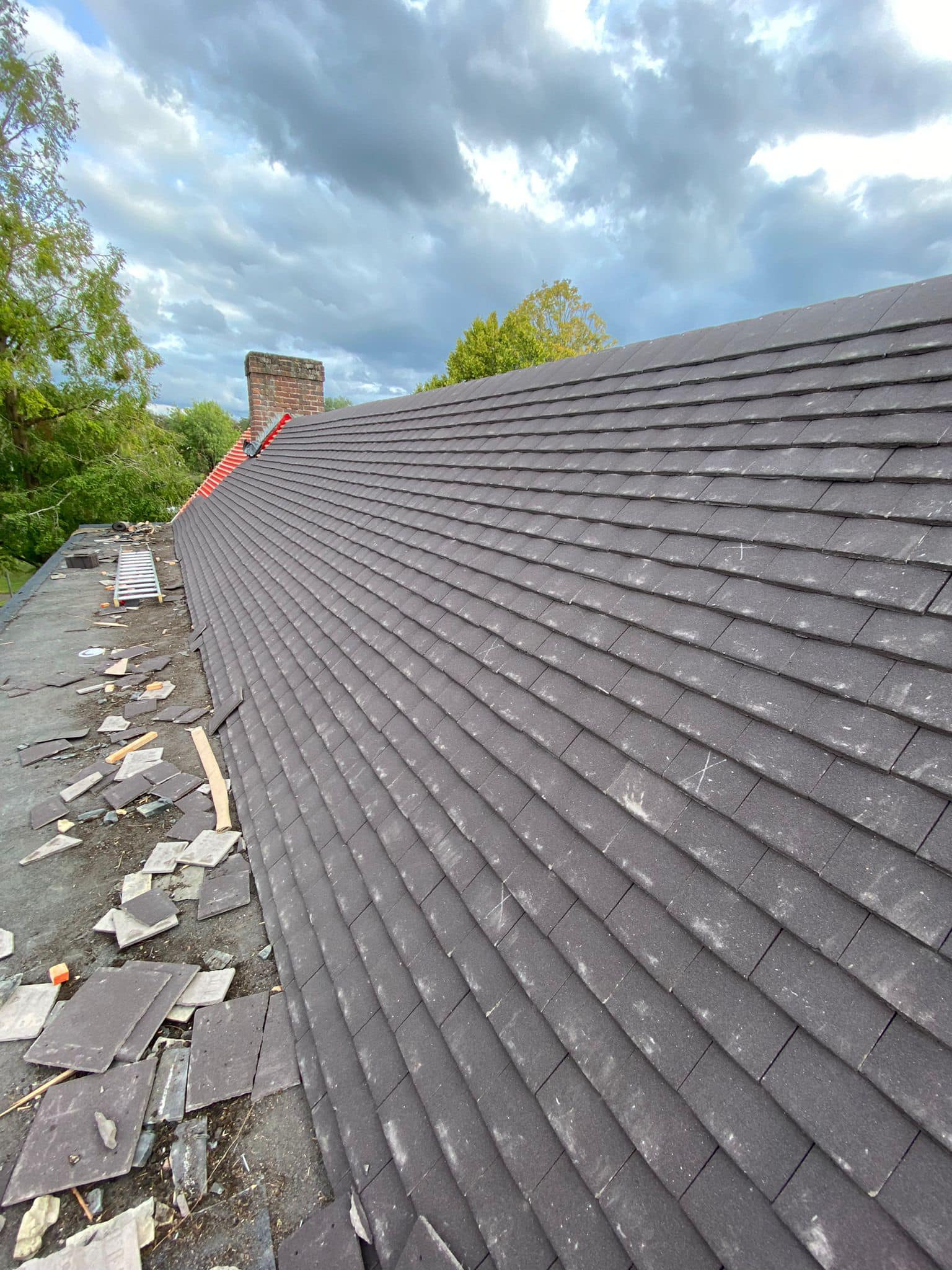 Professional roofers working on a property in London - KS Roof Master