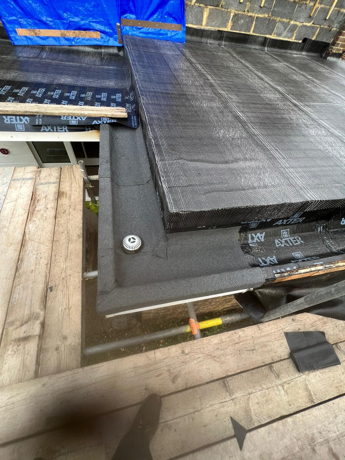 Flat roof coating in Brixton