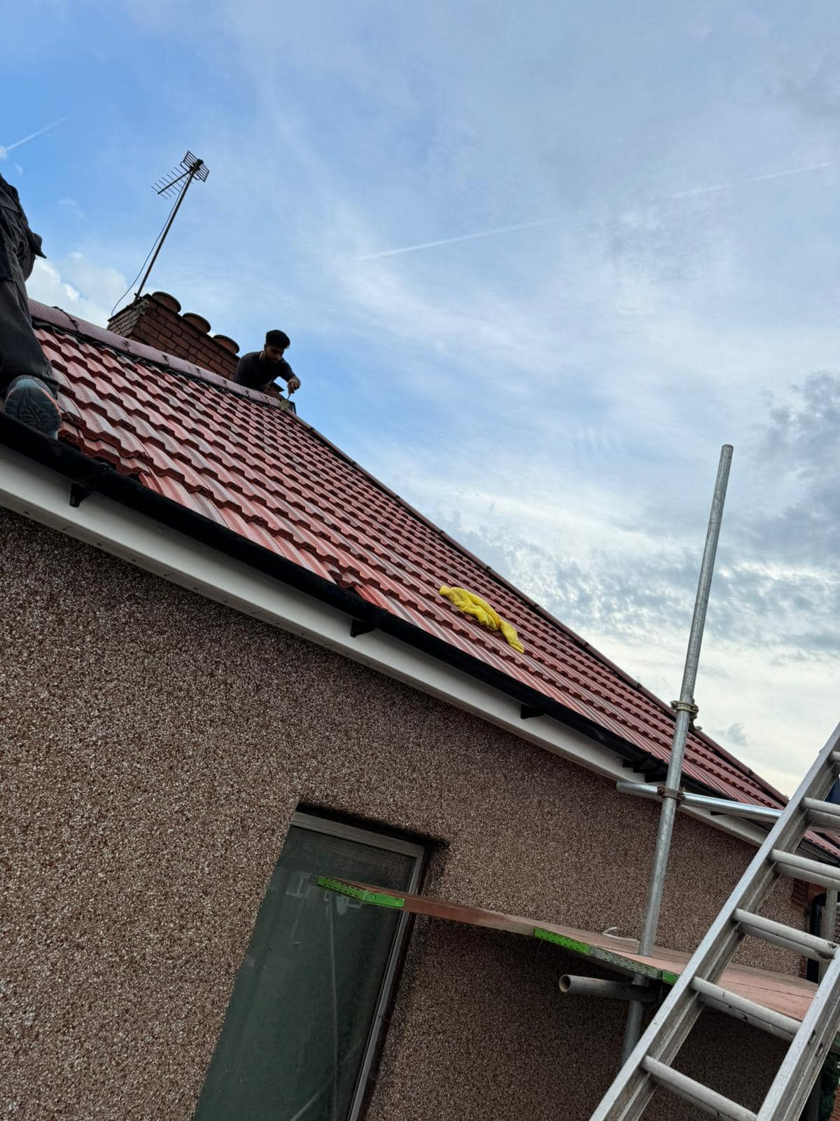 Professional roofers working on a property in London - KS Roof Master